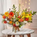 Arranjo Frutos do Sol com Flores e Frutas em Cachepô