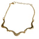 Pulseira Dourada Ondulada com  Zircônias Brilhante