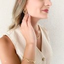 Pulseira Dourada Ondulada com  Zircônias Brilhante