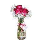 Trio de rosas no vidro